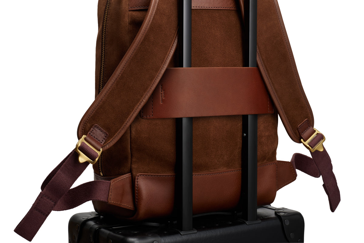 quality wide leather luggage strap on brown suede backpack 