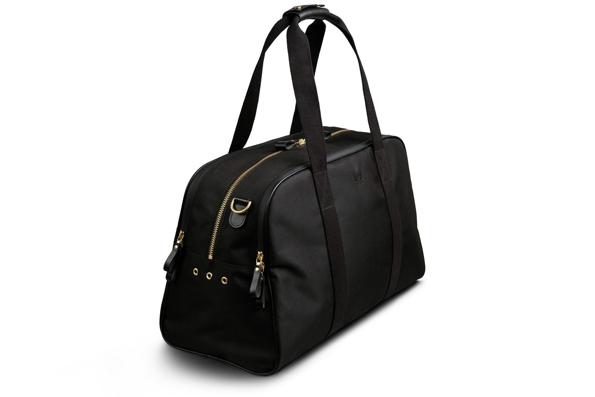 black sports holdall with a laptop compartment