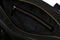 open view of the designer tennis bag in black, showing the inside pocket