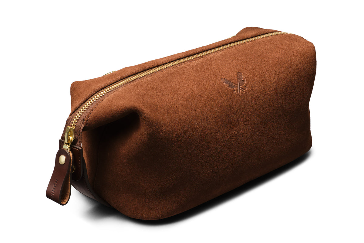side view of suede brown wash bag