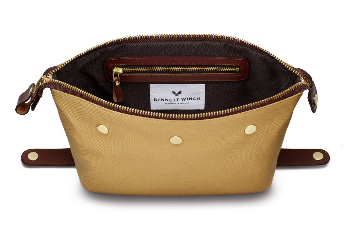 Tan wash bag with zipper inside 