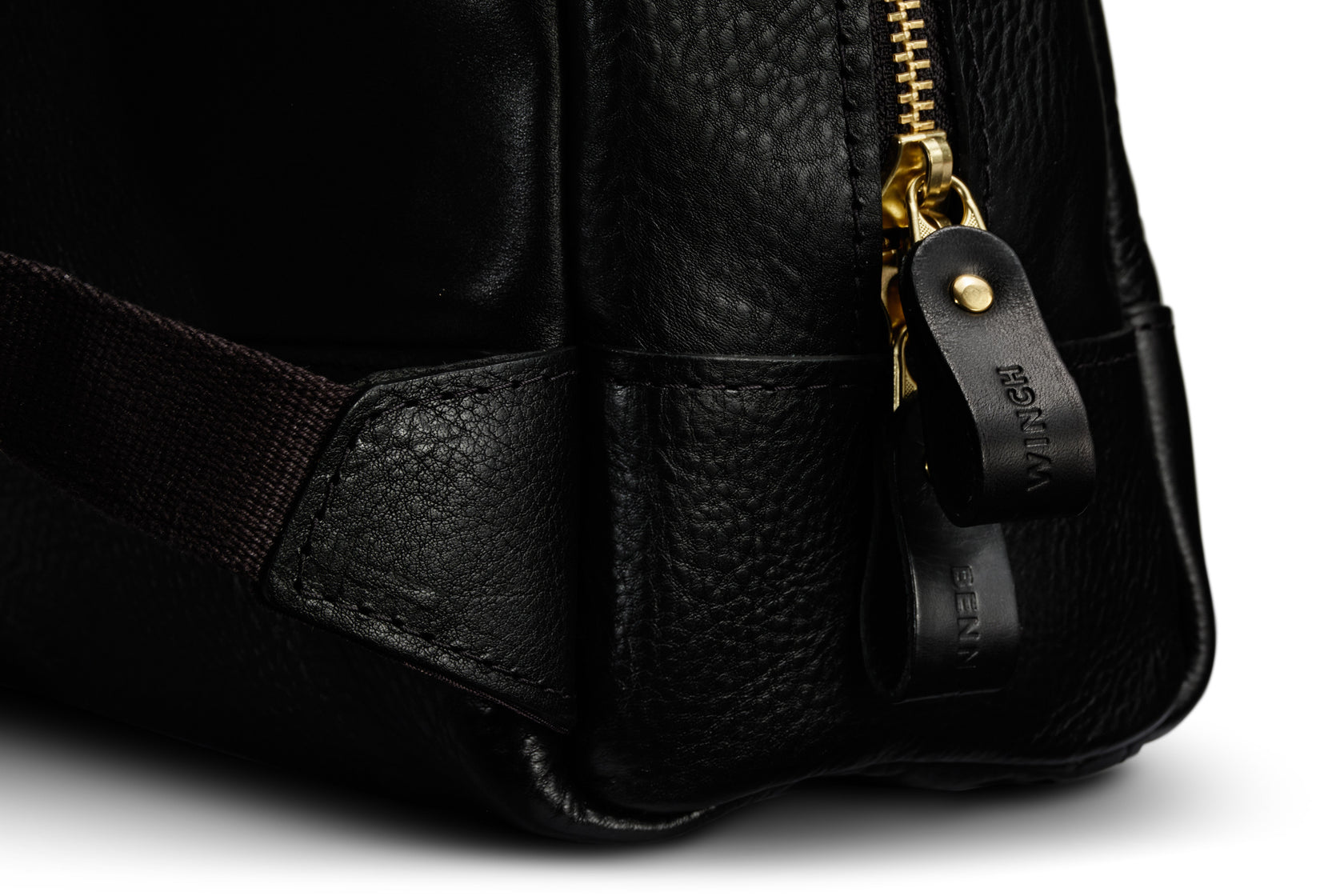 black zipper closure on leather black backpack