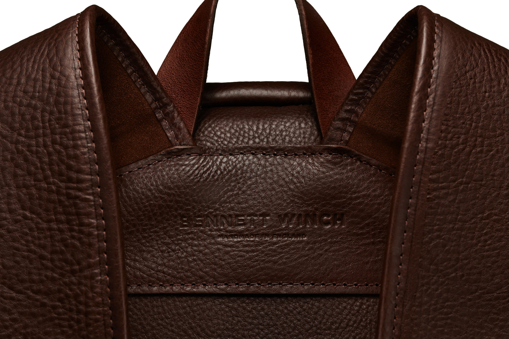 the Bennett Winch branding on the leather on the backside of backpack 