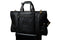 high end trifold on top of a suitcase