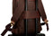 the thick leather luggage strap on the backpack 