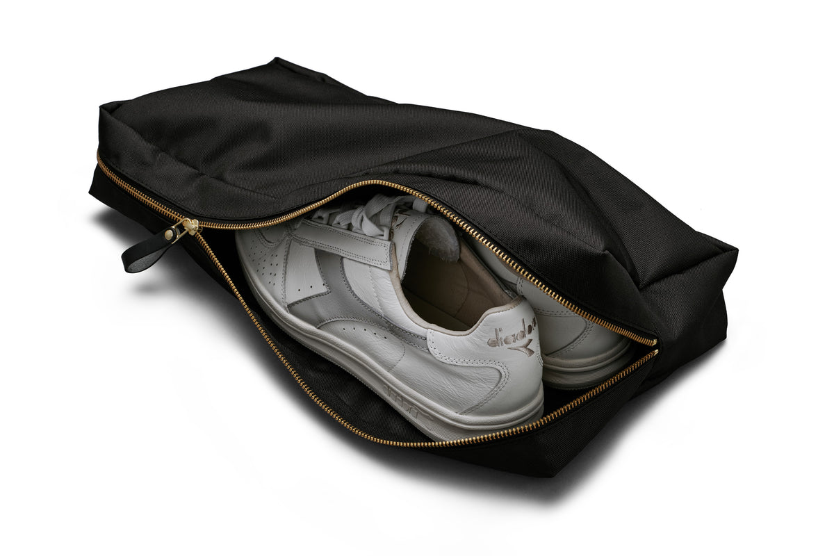 close up look at the separate shoe compartment that comes with the sports duffle bag
