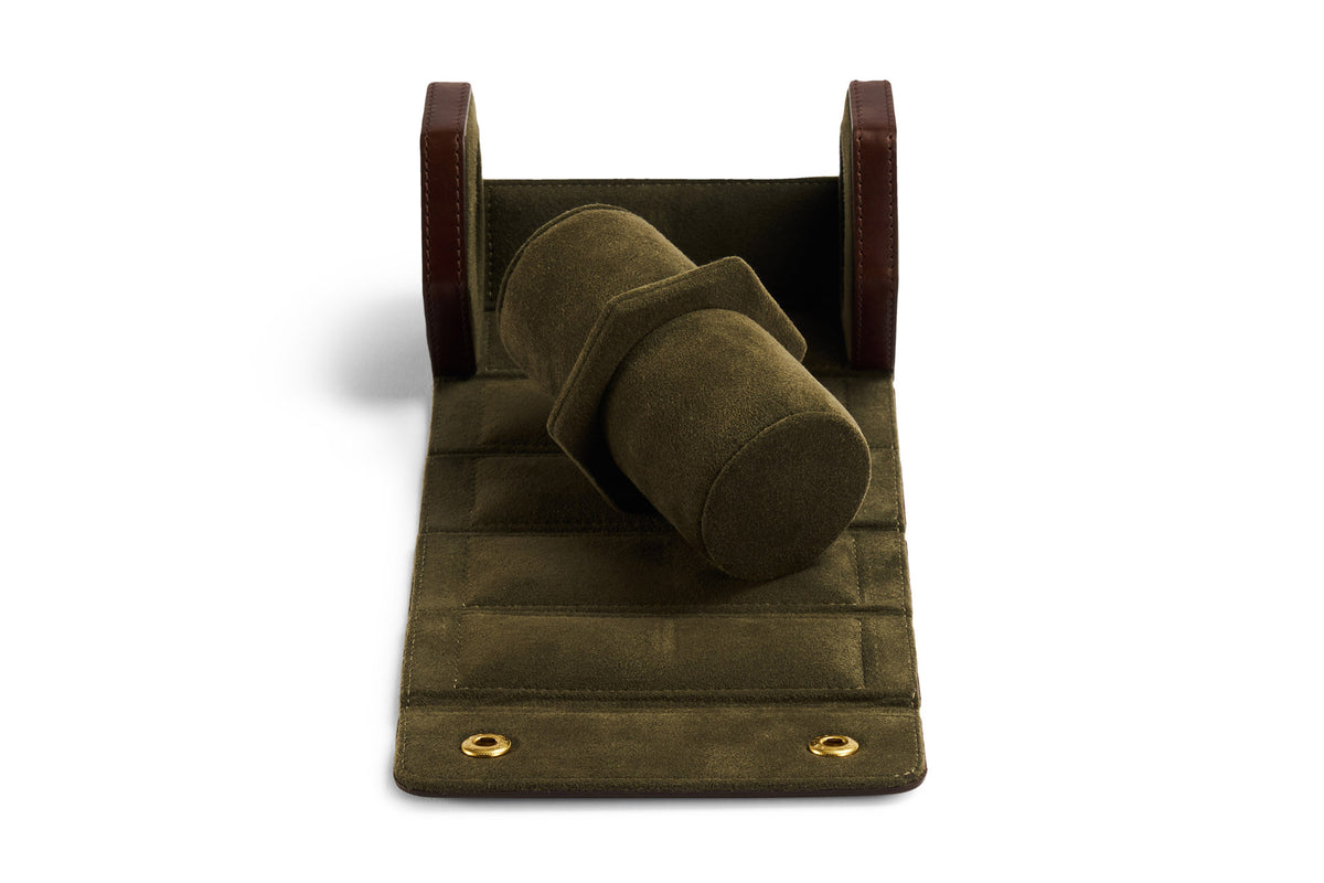 The interior of the brown leather two section watch roll 