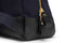 zip closure on luxury navy backpack