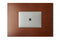 top shot of the Italian veg tanned light brown leather desk blotter and a closed laptop on top