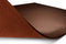 A shot showing the suede underside of the brown leather desk blotter 