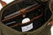 organizing space in green canvas tote bag 