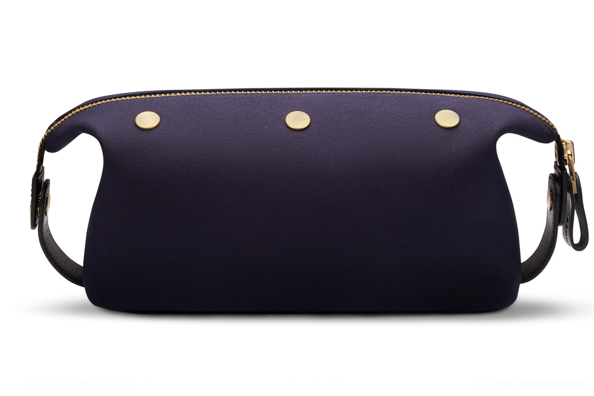 backside of navy dopp kit