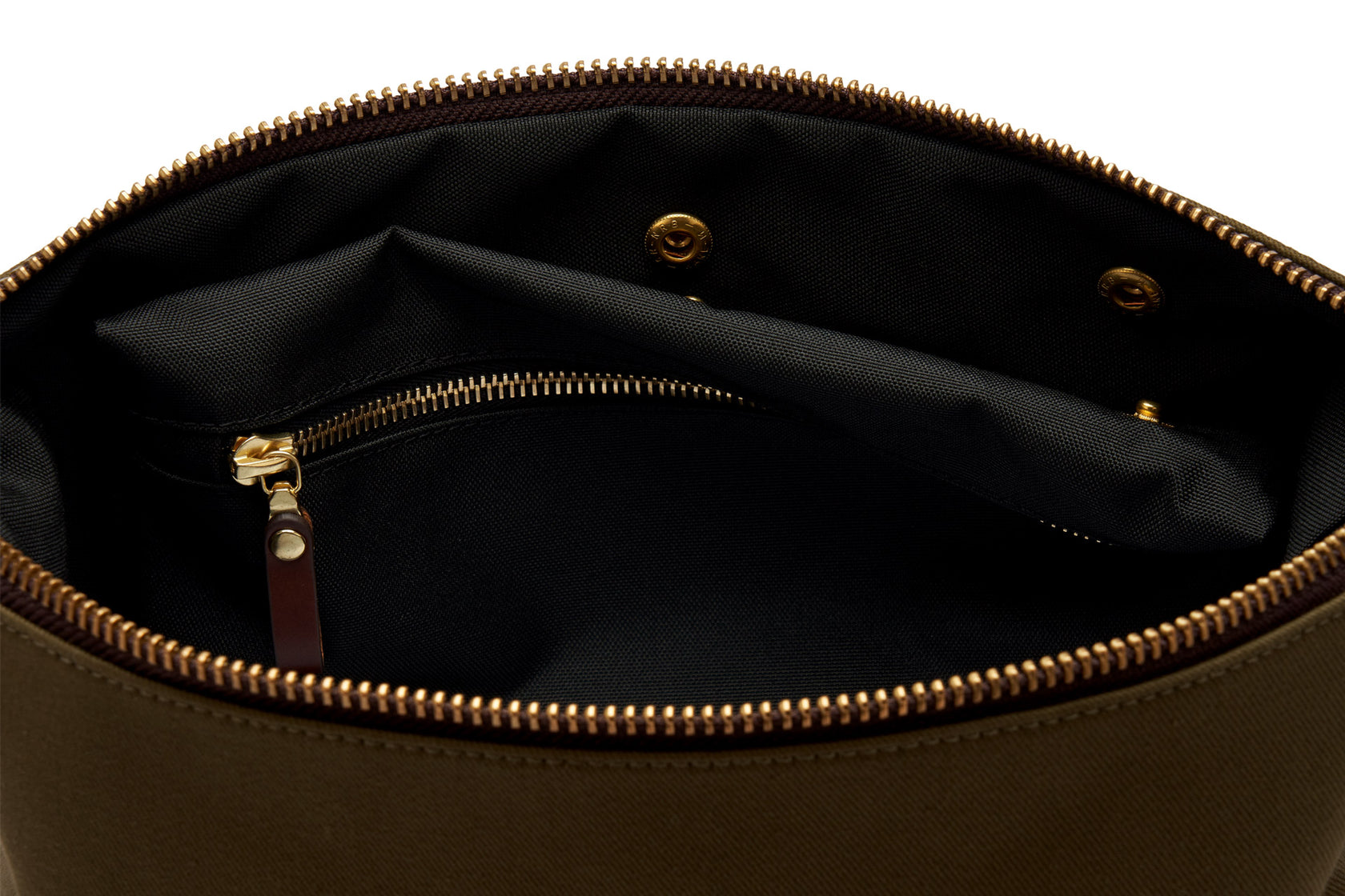 interior clip out wet compartment of green canvas dopp kit