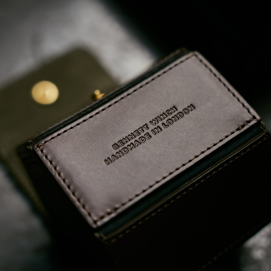 Bennett Winch made in London stamped into the brown leather watch roll lifestyle