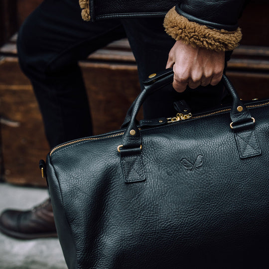 bennett winch black leather backpack Duffel whilst a pair of Classic leather, modern edge spring-accessories Reels model:SALTIGA10000H